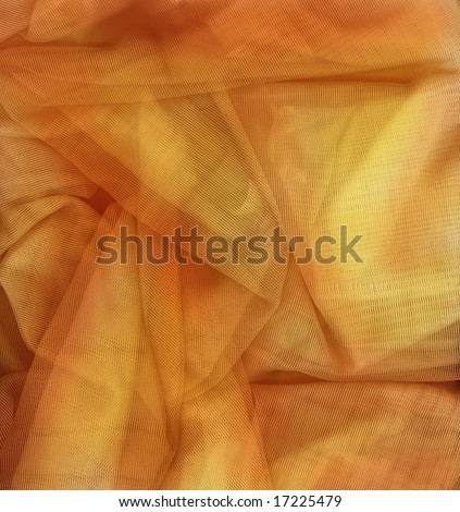 Orange and gold netting fabric perfect for a background.