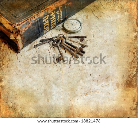 Vintage Bible with pocket-watch and keys on a grunge background with room for your own text.
