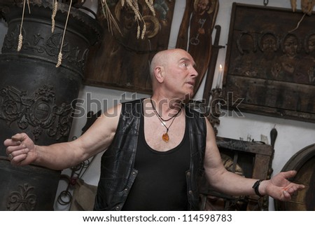 HOCZEW, POLAND - JULY 09: Zdzislaw Pekalski famous polish folk sculptor in his gallery on July 9, 2009 in Hoczew. He shows sculptures in the gallery \