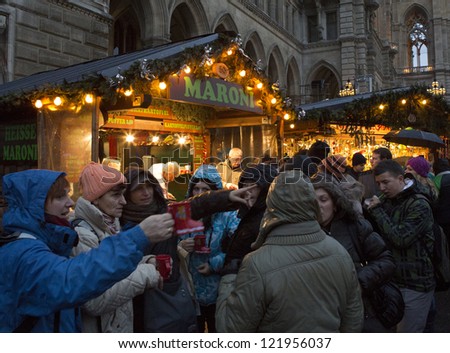 VIENNA, AUSTRIA - DECEMBER 15: Unidentified people visit the annual Christmas Fair on Rathaus square on 15 December, 2012 in Vienna, Austria. The fair is the most famous  in Central Europe.