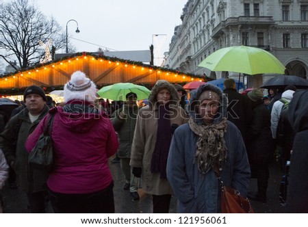 VIENNA, AUSTRIA - DECEMBER 15: Unidentified people visit the annual Christmas Fair on Rathaus square on 15 December, 2012 in Vienna, Austria. The fair is the most famous  in Central Europe.