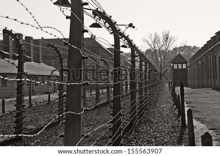 OSWIECIM, POLAND - OCTOBER 22: Barbed wire in Auschwitz Camp I, a former Nazi extermination camp on October 22, 2012 in Oswiecim, Poland. It was the biggest nazi concentration camp in Europe.