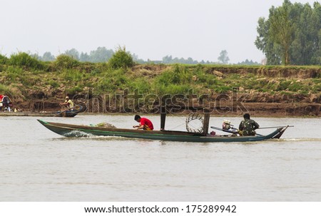CHAO DOC, VIETNAM - DECEMBER 29: Boat on the bank of Mekong river on December 29, 2013 in Chao Doc, Vietnam.