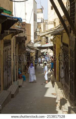 FEZ, MOROCCO - JULY 19: Unidentified people in the medina on July 19, 2014 in Fez, Morocco. The medina is listed as a UNESCO World Heritage Site.