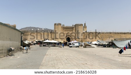 FEZ, MOROCCO - JULY 19: Unidentified people at the entrance gate of the city on July 19, 2014 in Fez, Morocco. The medina is listed as a UNESCO World Heritage Site.