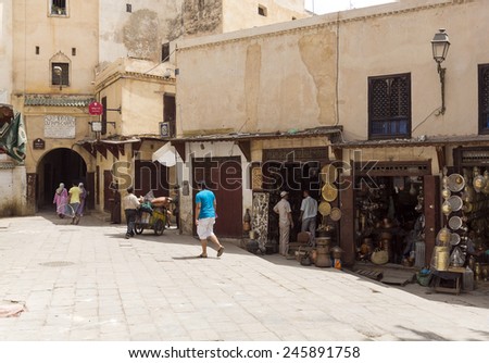 FEZ, MOROCCO - JULY 19: A souk as on July 19, 2014 in Fez, Morocco. The medina is listed as a UNESCO World Heritage Site and is believed to be one of the world\'s largest car-free urban areas.