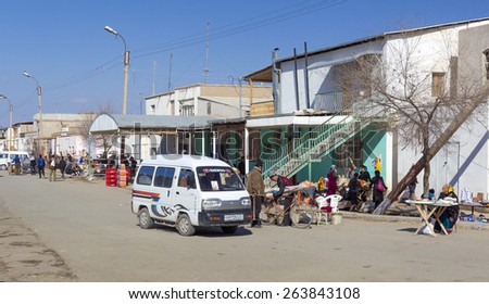 KHIVA, UZBEKISTAN - MARCH 21: Unidentified people selling goods in the medina on March 21, 2012 in Khiva, Uzbekistan. city of approximately 50,000 people located in Xorazm Province.