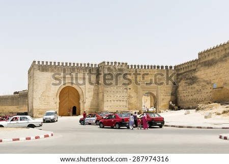 FEZ, MOROCCO - JULY 19: Unidentified people at the entrance gate of the city on July 19, 2014 in Fez, Morocco. The medina is listed as a UNESCO World Heritage Site.