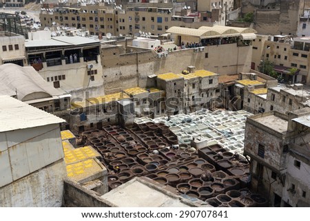 FEZ, MOROCCO - JULY 19: Areal view of the tannery souk of weavers on July 19, 2014 in Fez, Morocco. The tannery souk of weavers is the most visited part of the 2000 years old city.