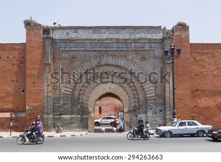 MARRAKESH ,MOROCCO - JUNE 4: Unidentified people at the gate Bab Agnaou in Marrakesh on June 4, 2013 in Morocco. With a population of over 900,000 inhabitants it is the most important city in Morocco.