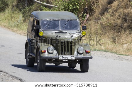 SANAHIN, ARMENIA - JULY 19, 2015: GAZ-69, a four wheel drive light truck on the road produced by GAZ (Gorkovsky Avtomobilnyi Zavod, Gorky Automobile Factory) between 1953 and 1955.