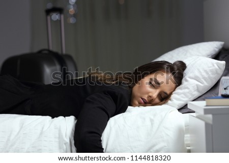 Similar – Image, Stock Photo Tired female traveler sleeping on airport.