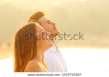 Similar – Image, Stock Photo Calm couple meditating together on mat at home