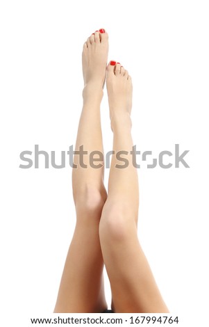 Beautiful waxing and smooth woman legs pointing up isolated on a white background