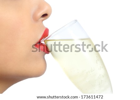 Close up profile of a woman lips with red lipstick drinking champagne isolated on a white background