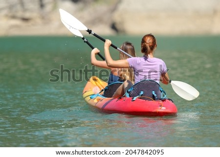 Similar – Image, Stock Photo Two kayaks on the water with reflection