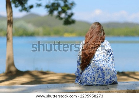 Similar – Image, Stock Photo Woman contemplating sea views