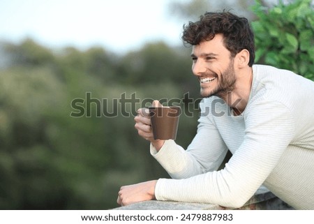 Similar – Image, Stock Photo Relaxed man on balcony with dog