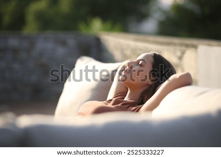 Similar – Image, Stock Photo Lady relaxing in sun augen