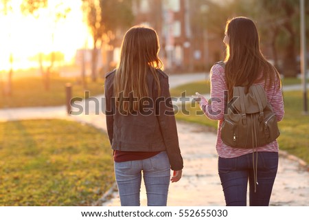 Similar – Image, Stock Photo Two teenager girls taking a selfie.