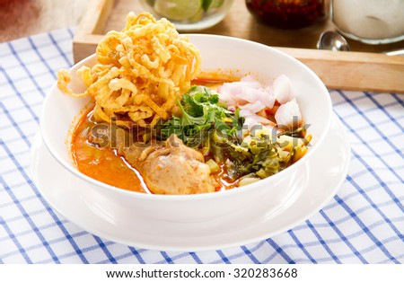 Khao soi, Northern Thai style curried noodle soup with chicken, Thai Food - Halal