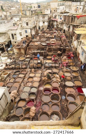 FEZ, MOROCCO - APRIL 15: Workers at leather factory perform the work on April 15, 2015. Tanning production is one of the most ancient in Morocco