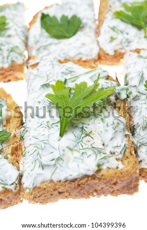 Roasted bread with curd and dill,  isolated on white
