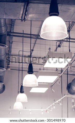 The lamp on the ceiling in the cafeteria de focus  monochrome photo