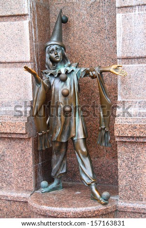 KIEV, UKRAINE - JULY 20: Pierrot. Bronze statue of character from fairy tale \