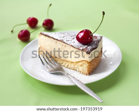 Milk souffle (bird\'s milk) cake with fresh cherry