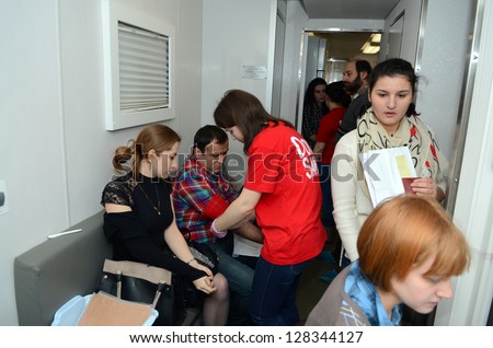 ROSTOV-ON-DON, RUSSIA - FEBRUARY 15: Donors in the queue - Donor action is devoted to the International Day children with cancer, February 15, 2013 in Rostov-on-Don, Russia.