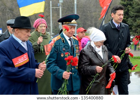 ROSTOV-ON-DON, RUSSIA - APRIL 11: The rally, placing flowers  International automobile race Ã?Â«Our Great VictoryÃ?Â» in honor of the Day of Victory in the WWII, April 11, 2013 in Rostov-on-Don, Russia