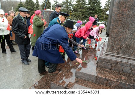ROSTOV-ON-DON, RUSSIA - APRIL 11: The rally, placing flowers  automobile race Ã?Â«Our Great VictoryÃ?Â» in honor of the Day of Victory in the WWII, April 11, 2013 in Rostov-on-Don, Russia
