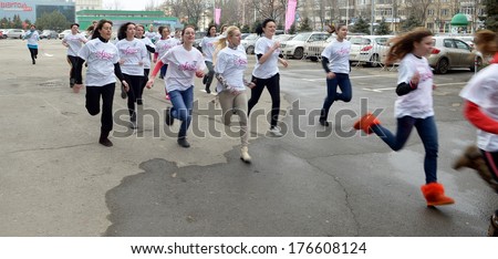 ROSTOV-ON-DON, RUSSIA - FEBRUARY 13: Flash-mob - 100m in uggah in support of the Olympic Games 2014. Rostov-on-Don, February 13, 2014 in Rostov-on-Don, Russia