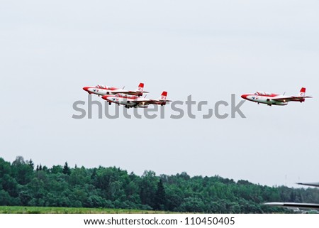VITEBSK, BELARUS - AUGUST 13: TS-11 jets from Bialo-Czerwone Iskry team fly from Zhukovsky, Russia to Poland, intermediate landing and fuelling at the Vitebsk airport, Belarus at August 13, 2012