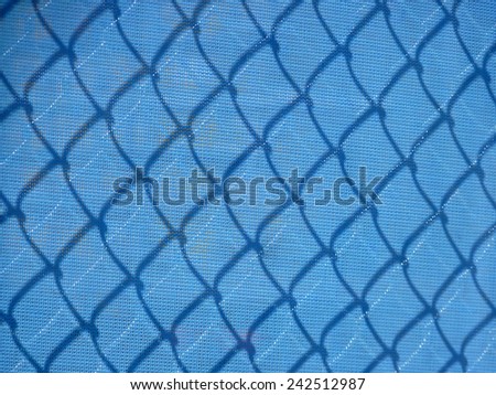 Wire and blue mesh fencing.