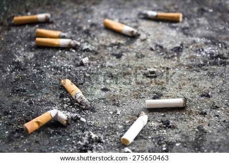 Similar – Image, Stock Photo Many cigarettes lie on the street and pollute the environment