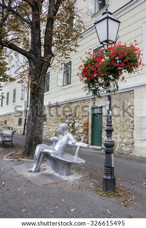 Zagreb, Croatia - September 24, 2015: The metal statue of the famous croatian writer Antun Gustav Matos on Upper town in Zagreb