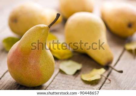 pears on wood table closeup