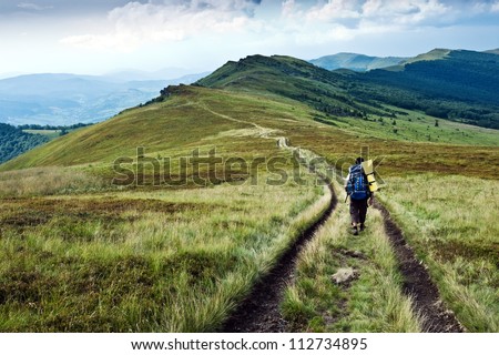 alone tourist in high mountain