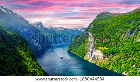 Panorama of breathtaking view of Sunnylvsfjorden fjord and famous Seven Sisters waterfalls, near Geiranger village in western Norway. Landscape photography