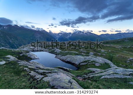Amazing view of small lake near Totensee lake on the top of Grimselpass. Alps, Switzerland, Europe.