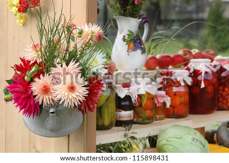 Harvest theme with canned fruit and vegetables
