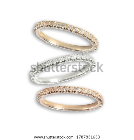Diamonds Wedding three colors Ring group on white background isolated cartier macro 商業照片 © 