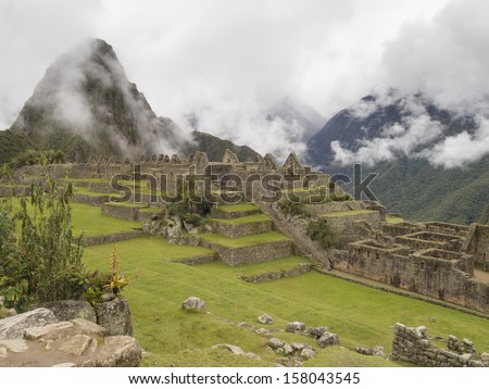 Machu Picchu - Mysterious city and archaeological site of pre-Columbian civilization of the Incas on the Andes cordillera mountains archeology near Cusco, Peru.