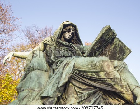 BERLIN, GERMANY -NOV 12: Statue of sibyl reclining on a sphinx and reading the book of history on November 12, 2011 in Berlin, Germany. This statue located in the Bismarck Memorial in Tiergarten.