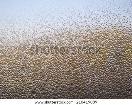 Water drop on a window as texture background.