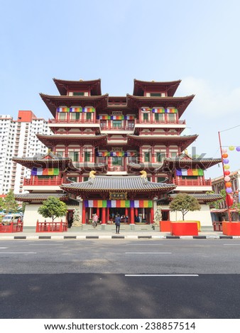 SINGAPORE - OCT 12, 2012: Buddha Tooth Relic Temple in Chinatown. The temple is based on the Tang dynasty architectural style and built to house the tooth relic of the historical Buddha.