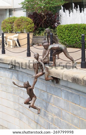 SINGAPORE - OCTOBER 12, 2012: Bronze sculpture of the \