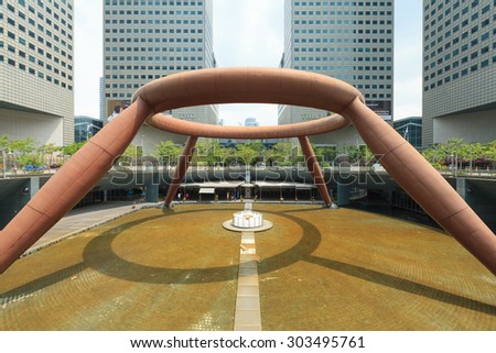 SINGAPORE - OCT 13: The Fountain of Wealth on October 13, 2012. Built in 1995, it is is the largest fountain in the world located in the commercial complex of Suntec City, Singapore.